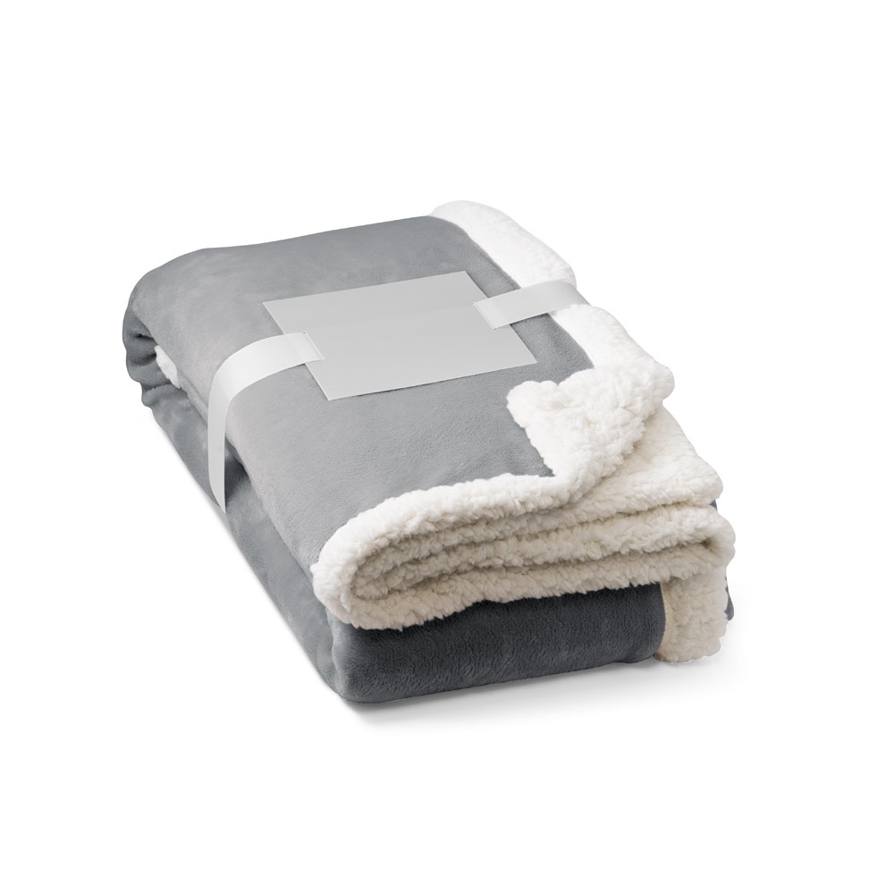 HEIDEN. Couverture polaire réversible (190 g/m²) avec ruban de satin et carte personnalisée