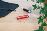 Vue 3 de Porte-clés avec décapsuleur Carla